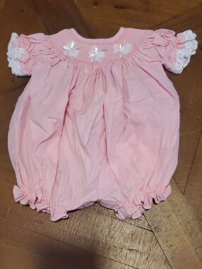 Pink Smocked Baby One-Piece Bodysuit with Lace Trim